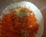 A picture of step 1 of Carrot & Banana Cake topped with icing and Banana crisp. 😀.