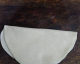 A picture of step 6 of Badam puri.