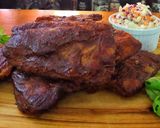 A picture of step 7 of Oven baked baby back ribs with dry rub and Bourbon BBQ sauce.
