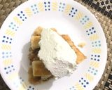 A picture of step 12 of Apple pie with flaky butter crust served with vanilla ice cream.