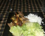 A picture of step 4 of Grilled chicken with olives.