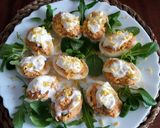 A picture of step 6 of Deviled Eggs with Tuna, Imitation Crab, and Seasoned Olives.