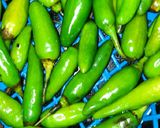 A picture of step 1 of Fry Green Chili.