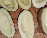 A picture of step 1 of Baked Potato 🥔 with Chicken Wings 😋.