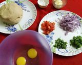 A picture of step 1 of Egg paratha.