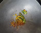 A picture of step 2 of Schezwan sandwich dosa.
