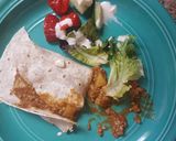 A picture of step 1 of Mince served with brown Tortilla and salad.