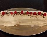 A picture of step 29 of Fresh Rasberry Cake Roll with Whipped White Chocolate Ganache Filling and Frosting.