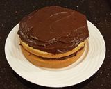 A picture of step 15 of Vanilla Layer Cake with Whipped Chocolate Ganache Filling and Whipped Coconut Cream Frosting.