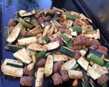 Une image de l'étape 6 de Courgettes aux merguez,tomate et épices.