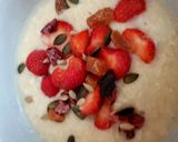 A picture of step 3 of Ready brek with fresh strawberries,Dried fruit & Seeds 😉.