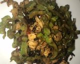 A picture of step 3 of Bitter gourd with pork belly with black bean sauce on.
