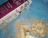 A picture of step 11 of Quaid e Azam police Medal QPM coffee cake.