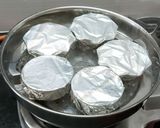 A picture of step 3 of Bhapa doi (steamed yoghurt pudding).