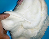 A picture of step 2 of Soft chapati served with beans.