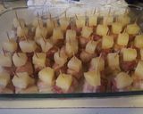 A picture of step 6 of Bacon wrapped chestnuts.