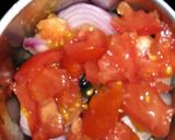A picture of step 3 of Egg matar masala.