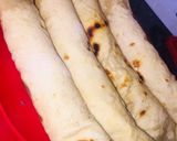 A picture of step 4 of Fried egg and plantain wraped in pita bread.