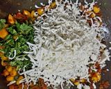 A picture of step 2 of Moong chilla with stuffing.