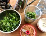 A picture of step 1 of Arugula and Cashew Pesto.