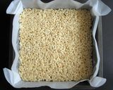 A picture of step 5 of Rice Bubbles & Marshmallow Slice.