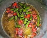 A picture of step 4 of Simple String beans rice bath.