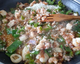 Foto del paso 5 de la receta: Paella de marisco congelado