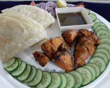 A picture of step 6 of Chicken tikka with chutney and paratha.
