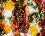 A picture of step 3 of Shakshouka (Eggs in Spicy Tomato Sauce).