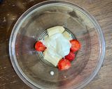 A picture of step 3 of Strawberry banana smoothie using a hand blender.