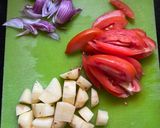 A picture of step 1 of Alu Aur Tamatar Pulao Potato and Tomato Pilaf.