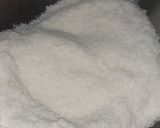 A picture of step 1 of Coconut burfi.