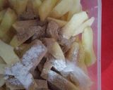 A picture of step 2 of Kfc style chicken garlic fries.