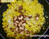 A picture of step 7 of Aloo Poha (Potato with Flattened Rice Pulao).