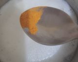 A picture of step 1 of Haldi wala dudh.