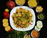 A picture of step 3 of Chat pata Biscuit bhel.    .