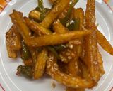 A picture of step 2 of Crispy honey chilli potato.