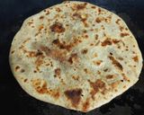A picture of step 14 of Anjeer gud ki puran poli.