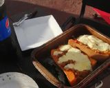 Foto del paso 6 de la receta: Calabacín relleno de carne cebolla y morrón