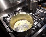 A picture of step 4 of Porotos con Riendas with Smoked Ham.