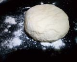 A picture of step 14 of Chicken tikka pizza in lock down (karahi baking).