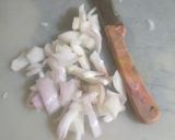 A picture of step 3 of Steamed stuffed idli.