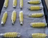 Foto del passaggio 4 della ricetta Cannoli di sfoglia con crema pasticcera