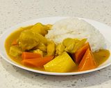 A picture of step 5 of Curry Chicken.