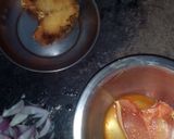 A picture of step 9 of Aloo fulcopi katla rosha ar misti doi.