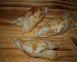 Foto del paso 7 de la receta: Empanadas salchicha, queso y tomate