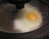 A picture of step 2 of Fried egg and bacon sarnie.