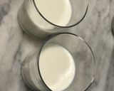Foto del passaggio 2 della ricetta Panna cotta ai cachi con nocciole caramellate