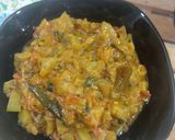 A picture of step 7 of Lauki coconut masala.