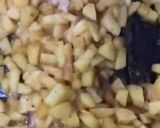 A picture of step 3 of Apple pie with flaky butter crust served with vanilla ice cream.